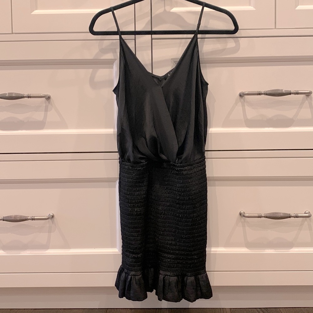 Fab'rik black dress with small ruffle at bottom. Size small and never been worn